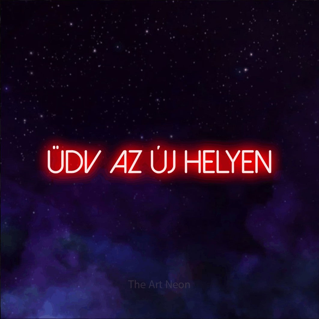 LED neon sign reading “ÜDV AZ ÚJ HELYEN”, arranged in a single line.