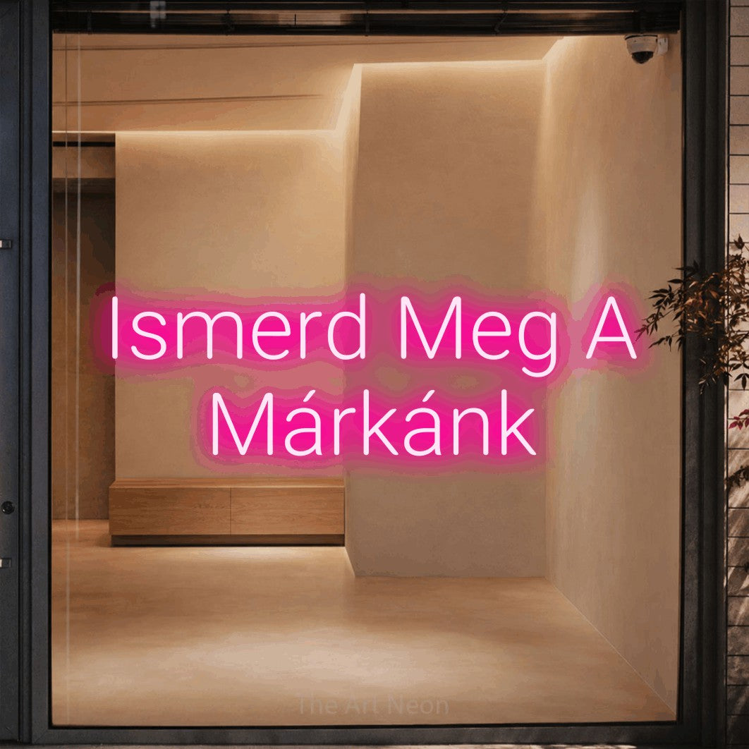 LED neon sign reading “Ismerd Meg A Márkánk”, arranged in two lines.