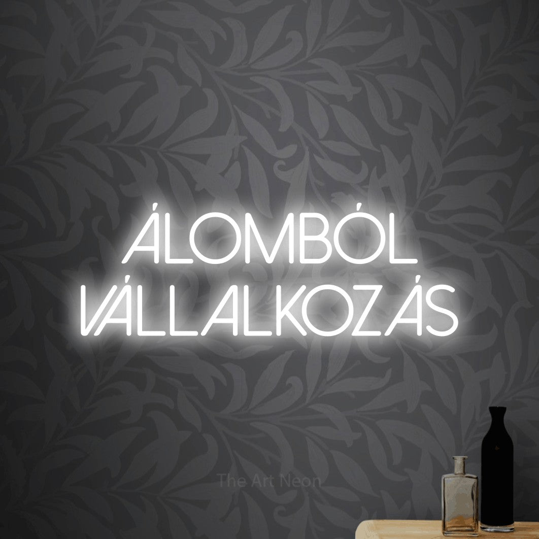 LED neon sign reading “Álomból Vállalkozás”, arranged in two lines.