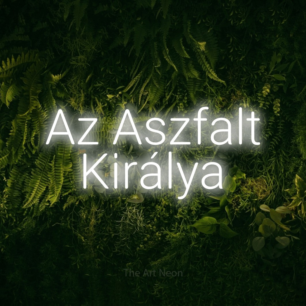 LED neon sign reading “Az Aszfalt Királya”, arranged in two lines.