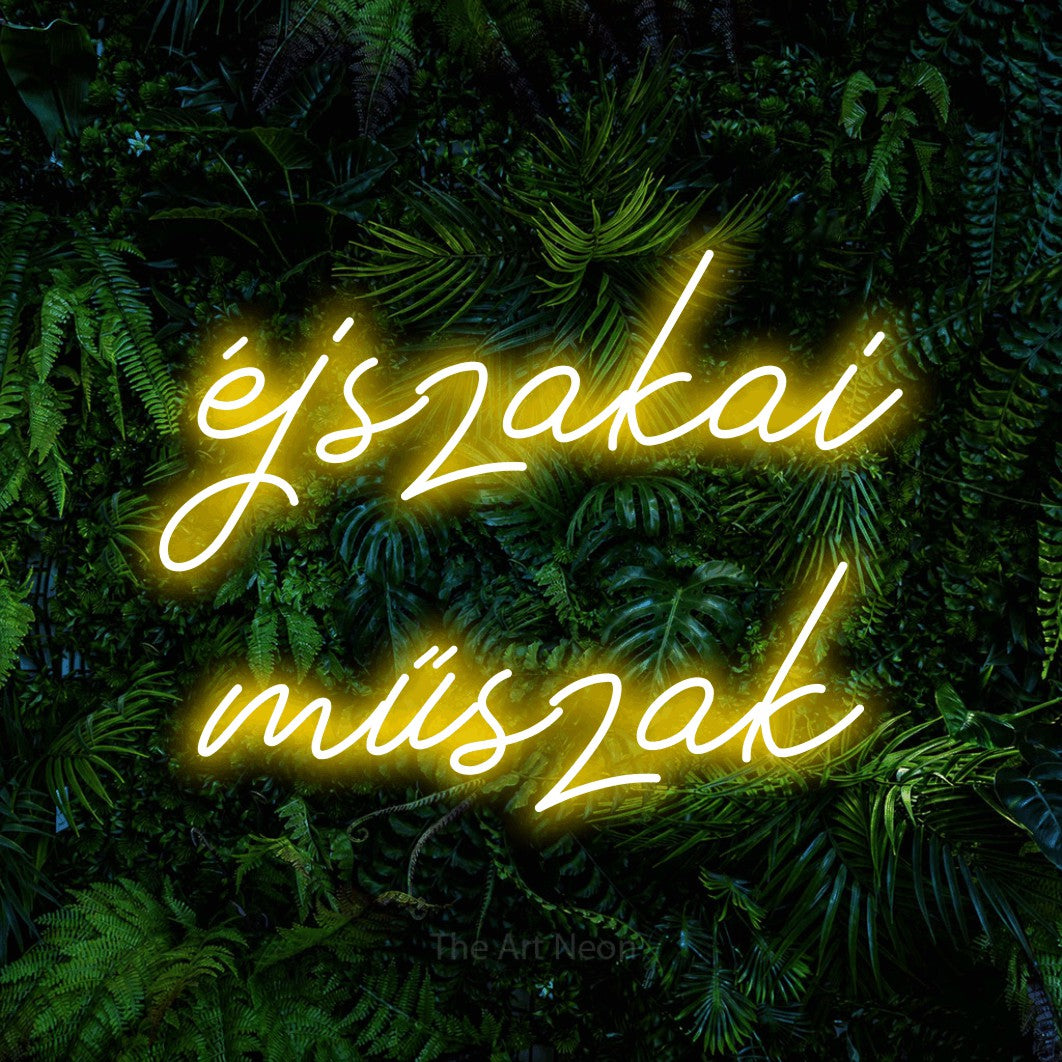 LED neon sign reading “éjszakai műszak”, arranged in two lines.