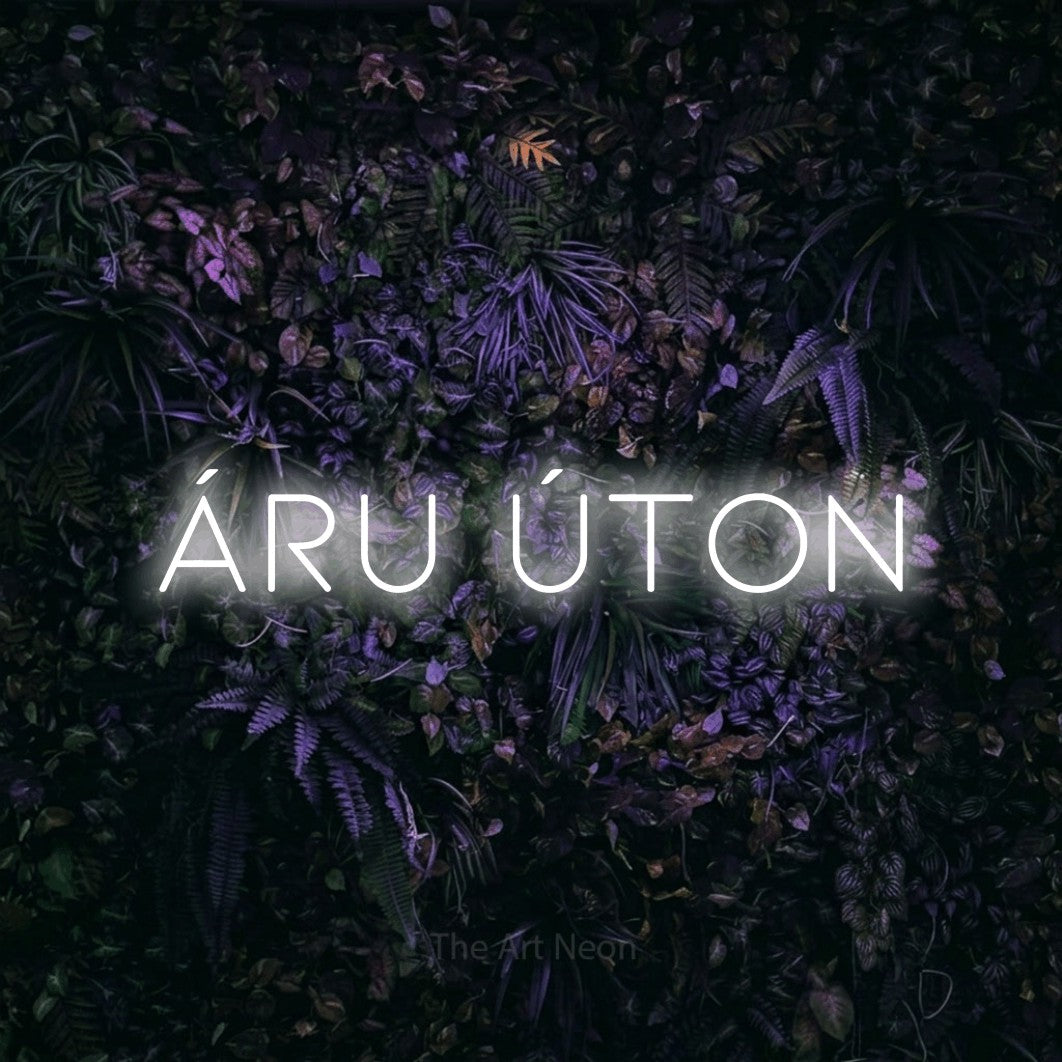 LED neon sign reading “ÁRU ÚTON”, arranged in a single line.