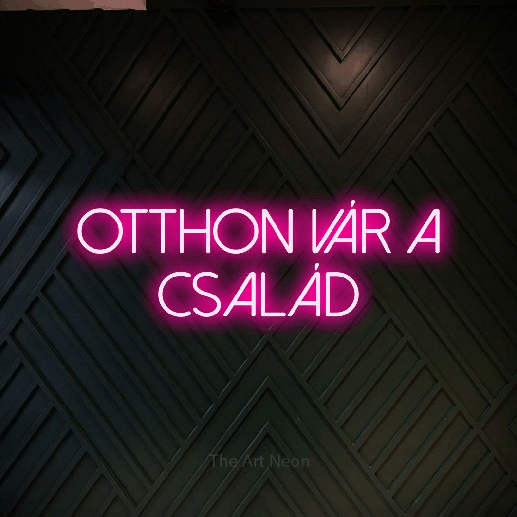 LED neon sign reading “OTTHON vár a család”, arranged in two lines.