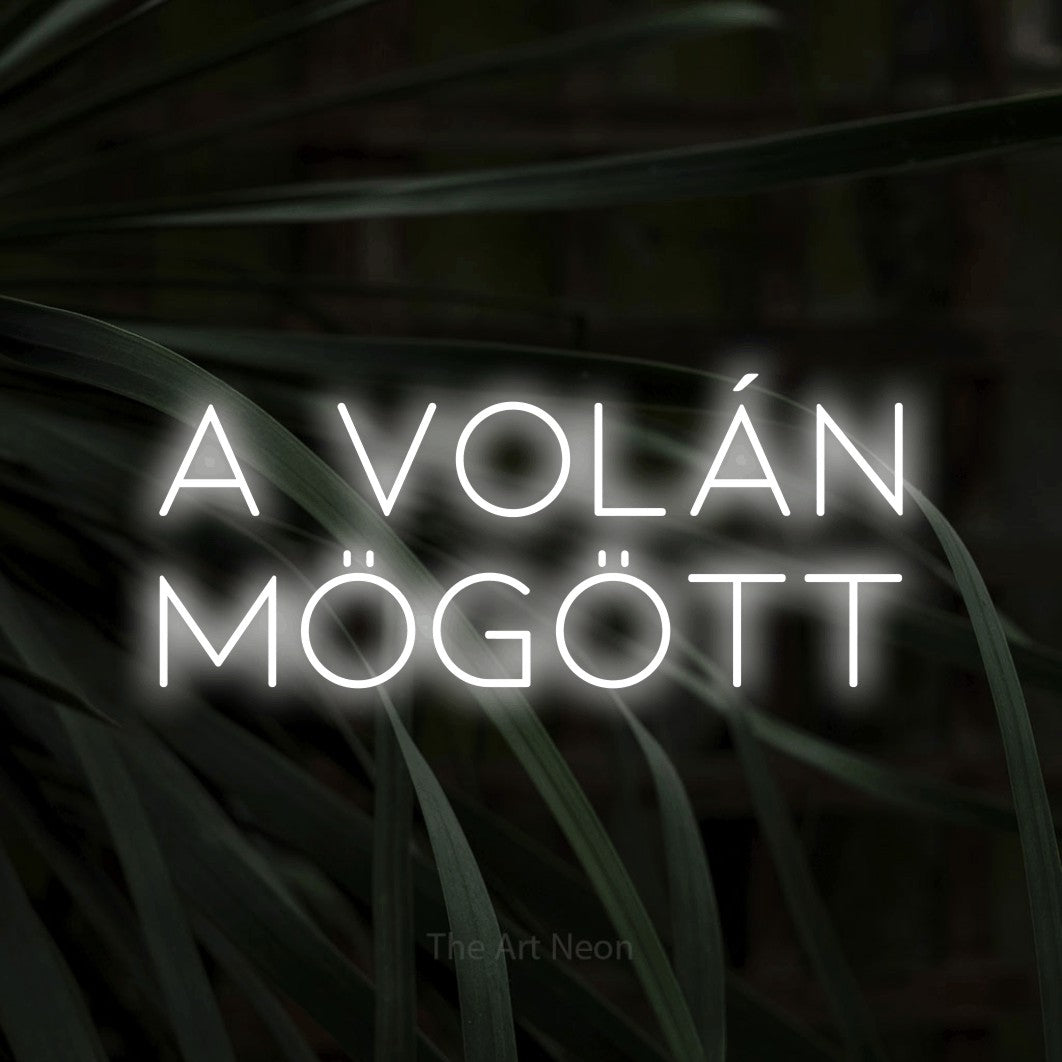 LED neon sign reading “a volán MÖGÖTT”, arranged in two lines.