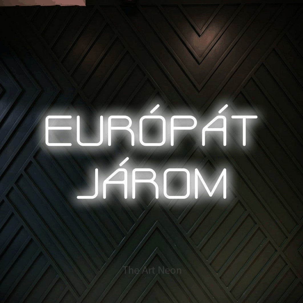 LED neon sign reading “EURÓPÁT JÁROM”, arranged in two lines.