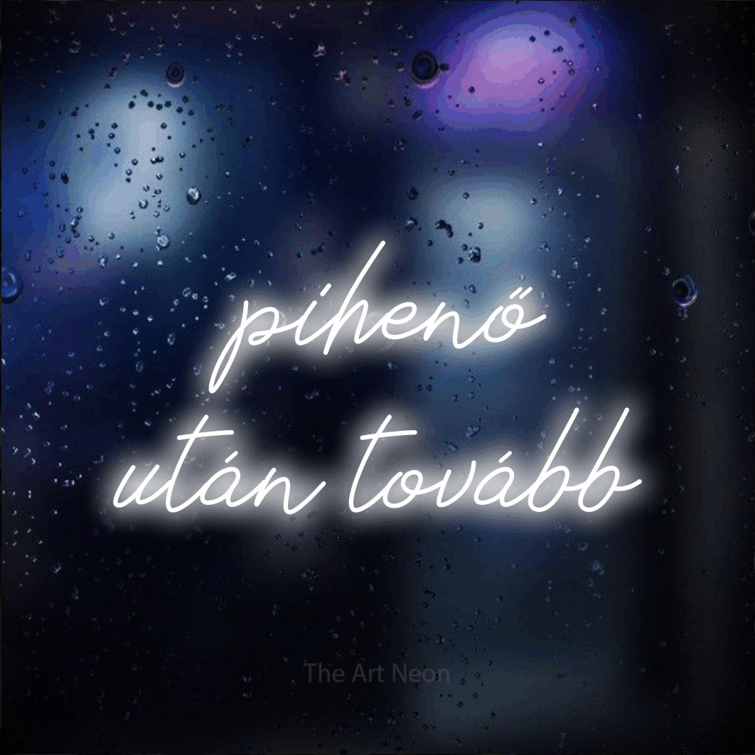 LED neon sign reading “pihenő után tovább”, arranged in two lines.