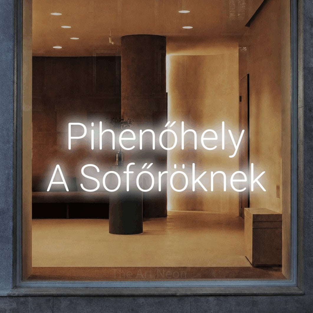 LED neon sign reading “Pihenőhely A Sofőröknek”, arranged in two lines.