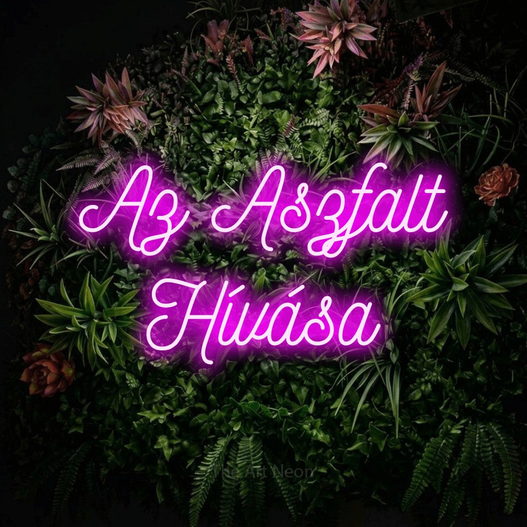LED neon sign reading “Az Aszfalt Hívása”, arranged in two lines.