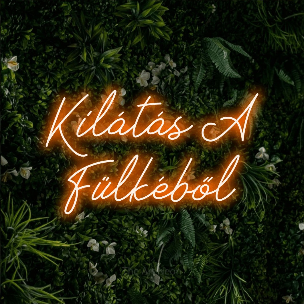 LED neon sign reading “Kilátás A Fülkéből”, arranged in two lines.