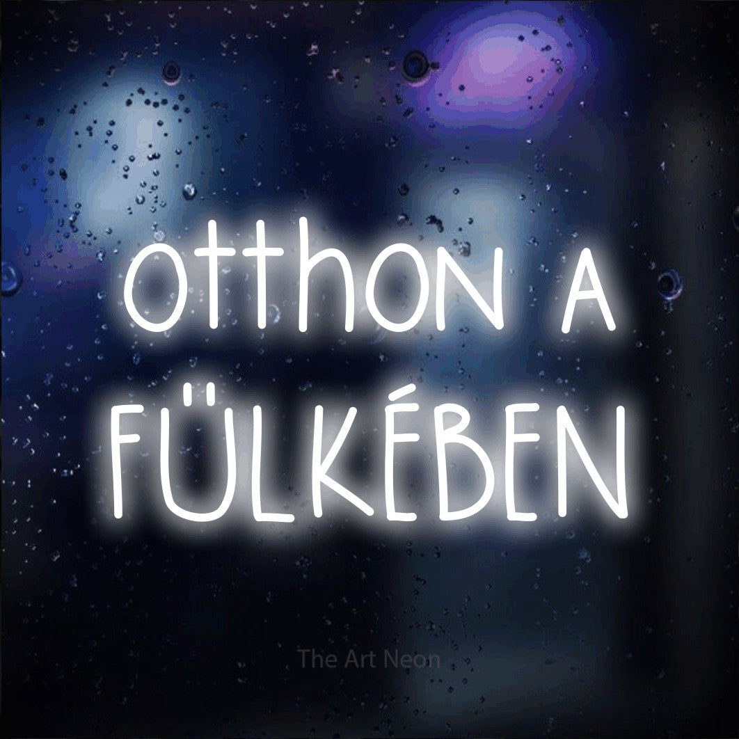 LED neon sign reading “otthon a FÜLKÉBEN”, arranged in two lines.