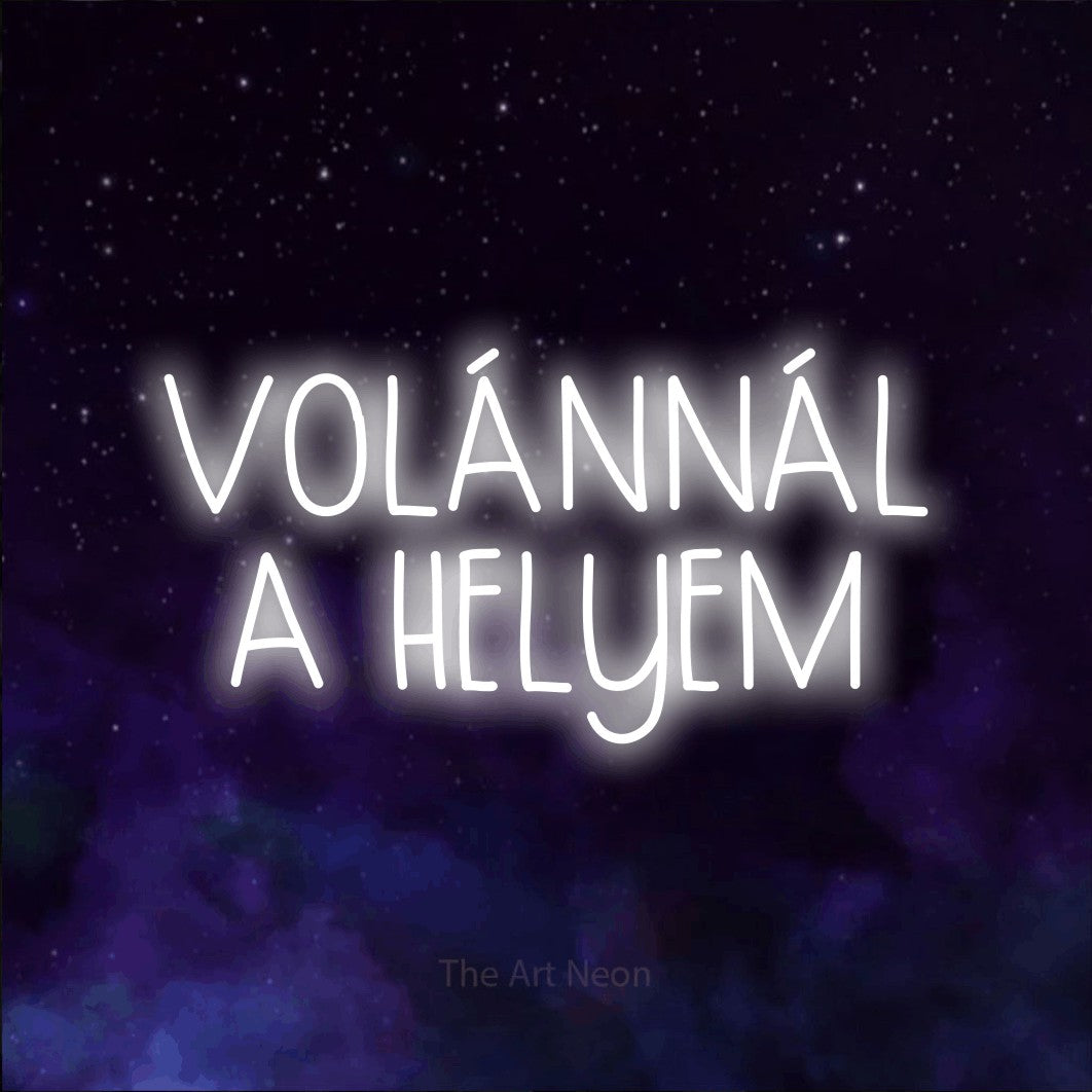 LED neon sign reading “VOLÁNNÁL A HELYEM”, arranged in two lines.