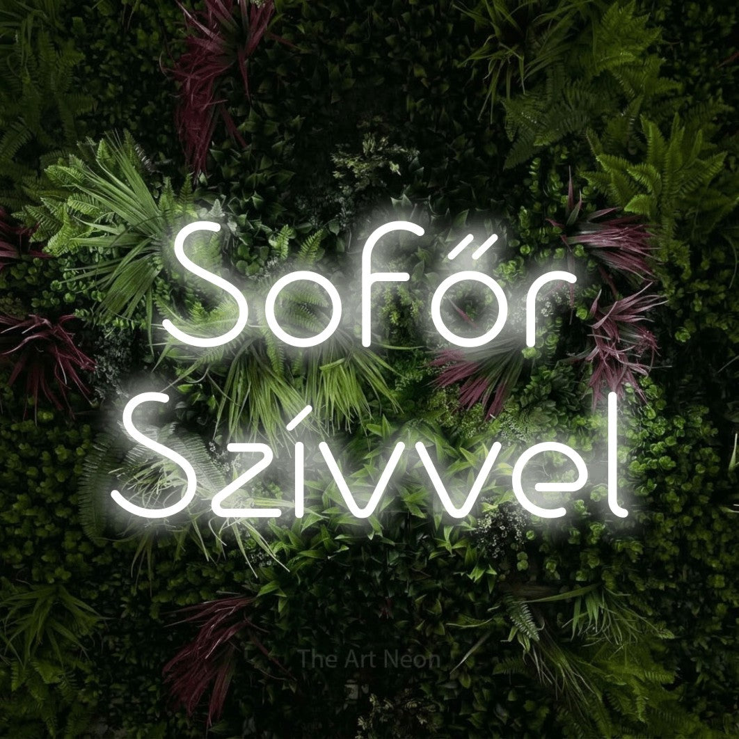LED neon sign reading “Sofőr Szívvel”, arranged in two lines.
