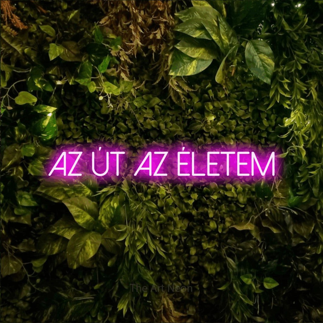 LED neon sign reading “az út az életem”, arranged in a single line.