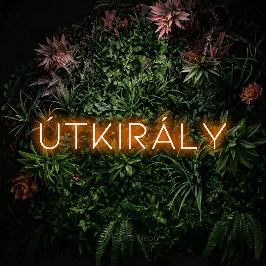 LED neon sign reading “Útkirály”, arranged in a single line.