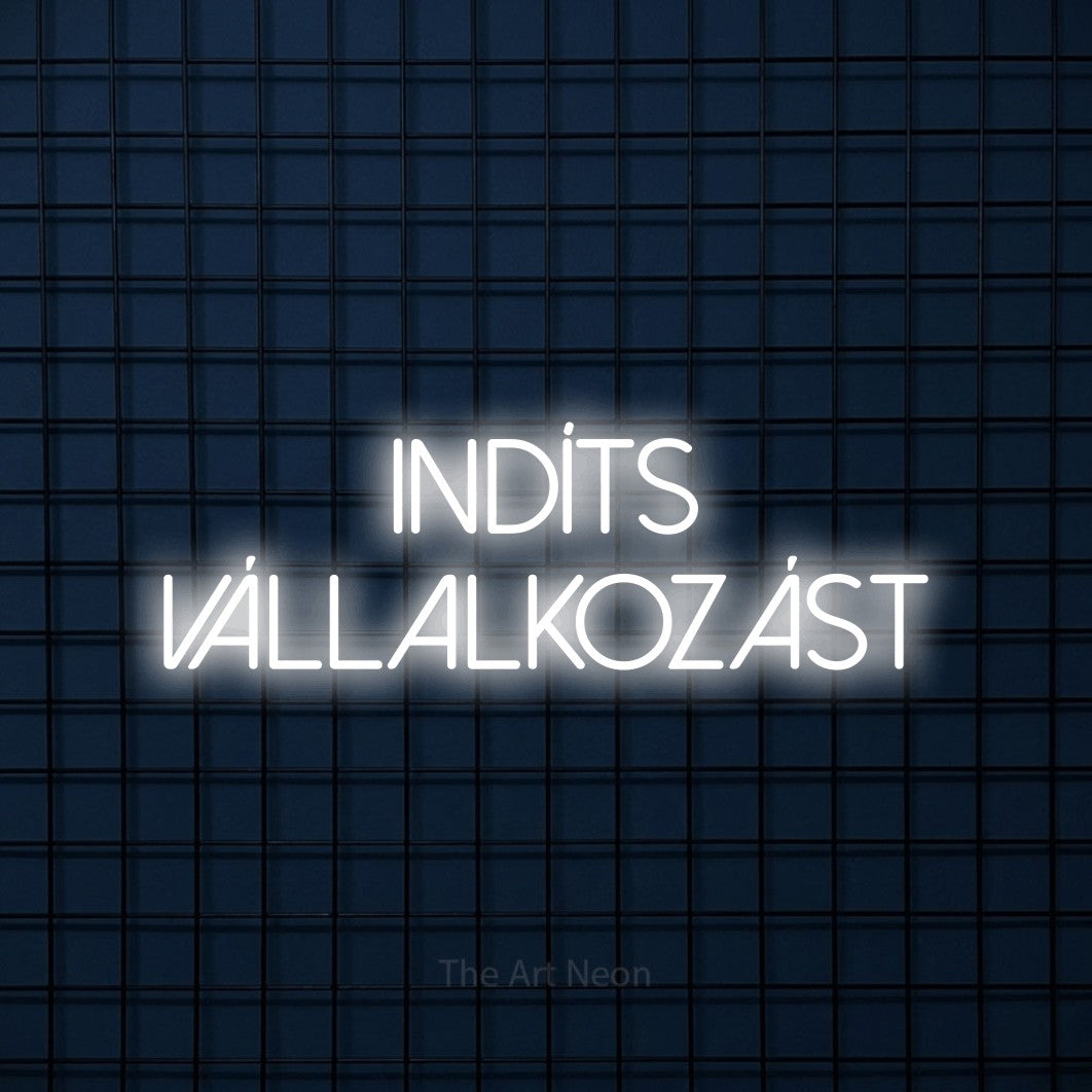 LED neon sign reading “INDÍTS VÁLLALKOZÁST”, arranged in two lines.