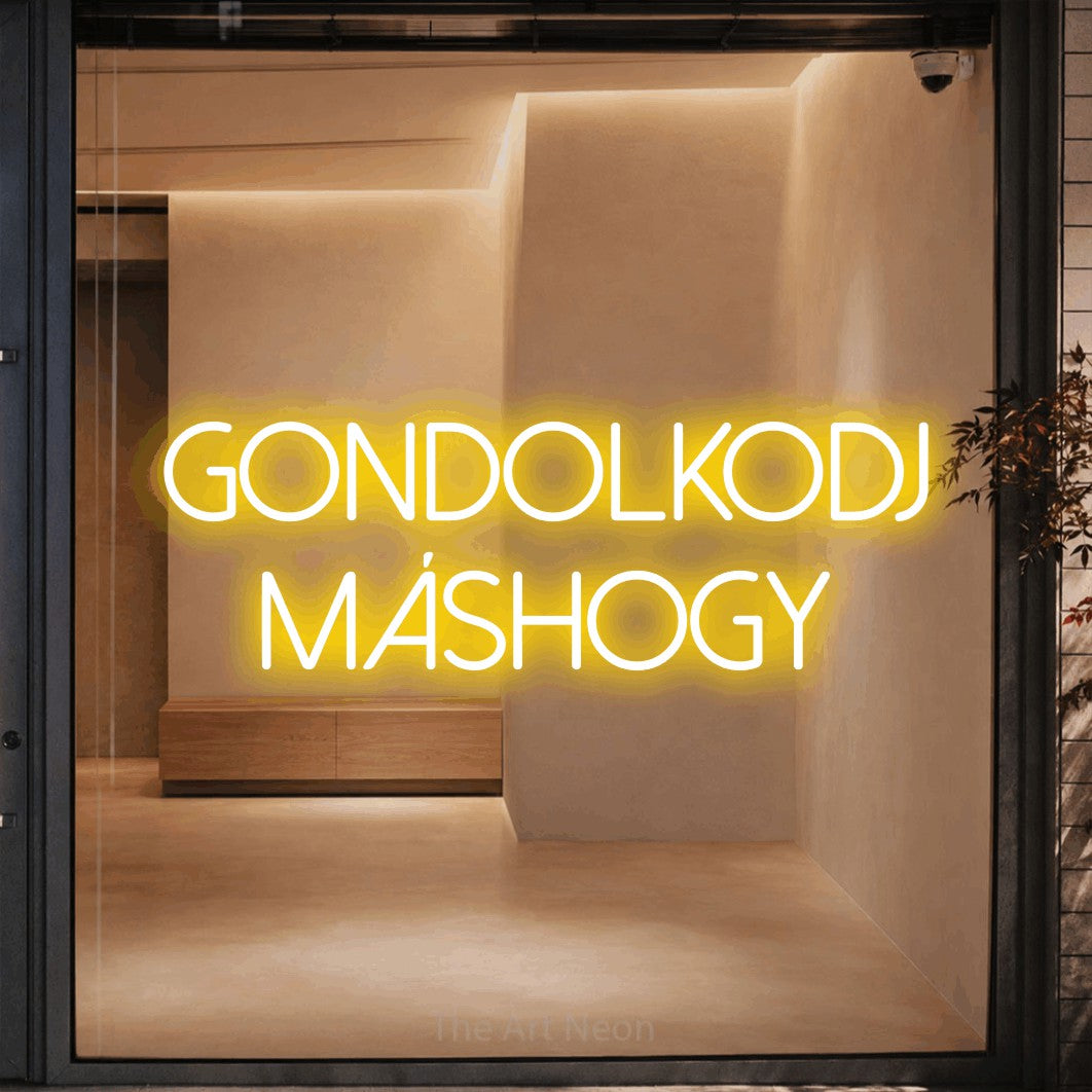 LED neon sign reading “Gondolkodj Máshogy”, arranged in two lines.