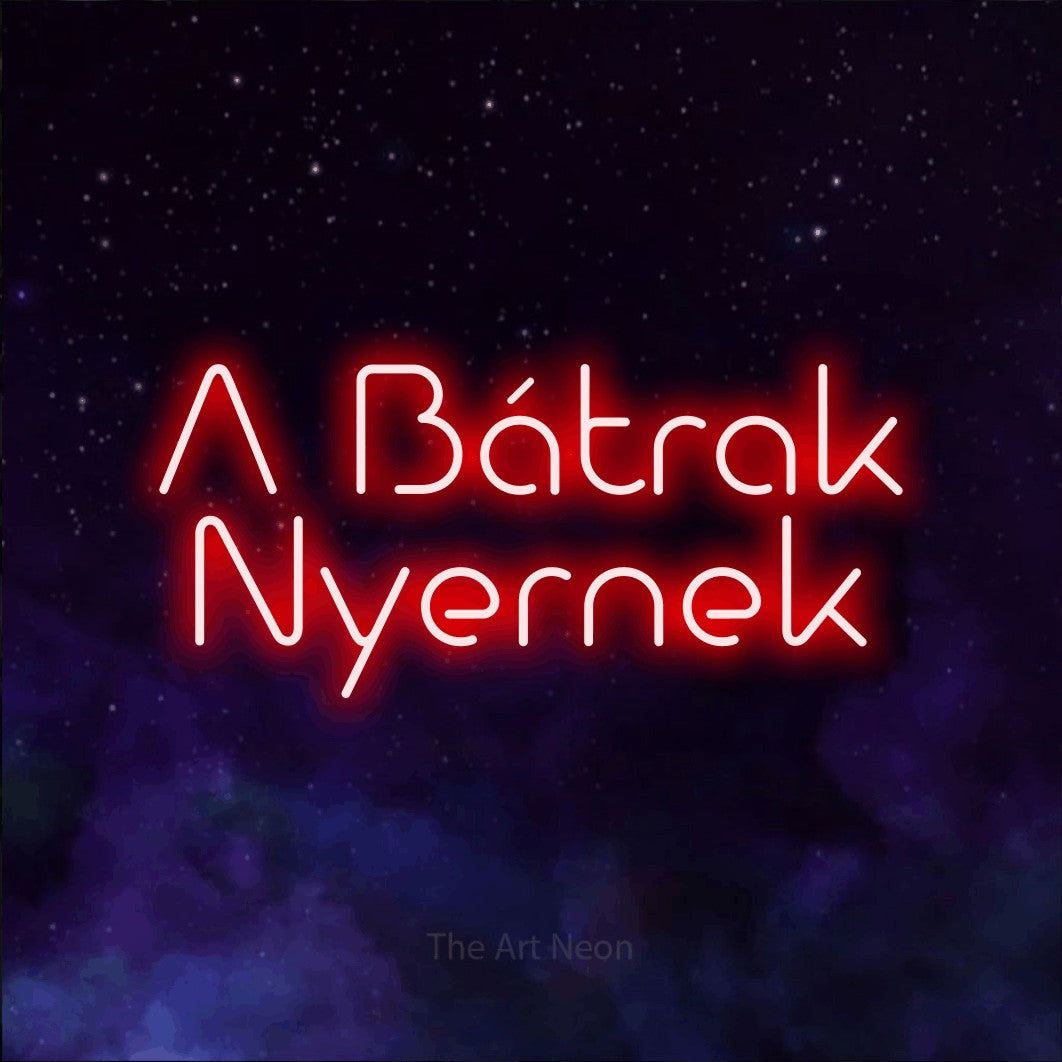 LED neon sign reading “A Bátrak Nyernek”, arranged in two lines.