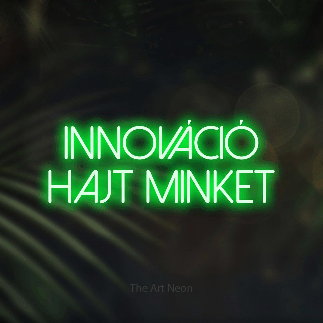 LED neon sign reading “INNOVÁCIÓ HAJT MINKET”, arranged in two lines.