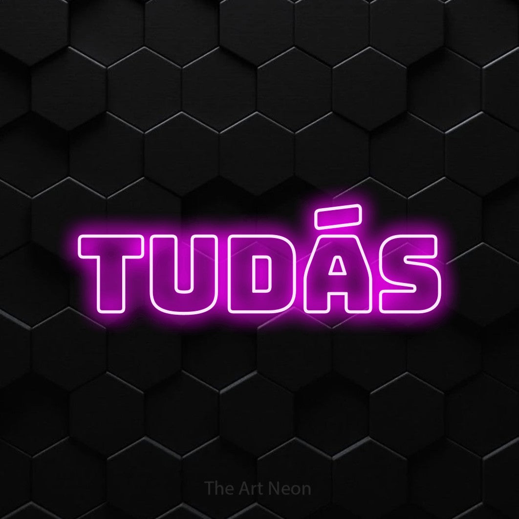 LED neon sign reading “tudás”, arranged in a single line.