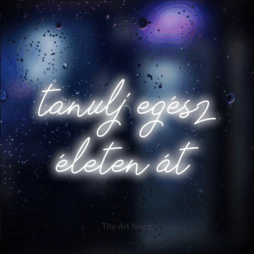 LED neon sign reading “tanulj egész életen át”, arranged in two lines.