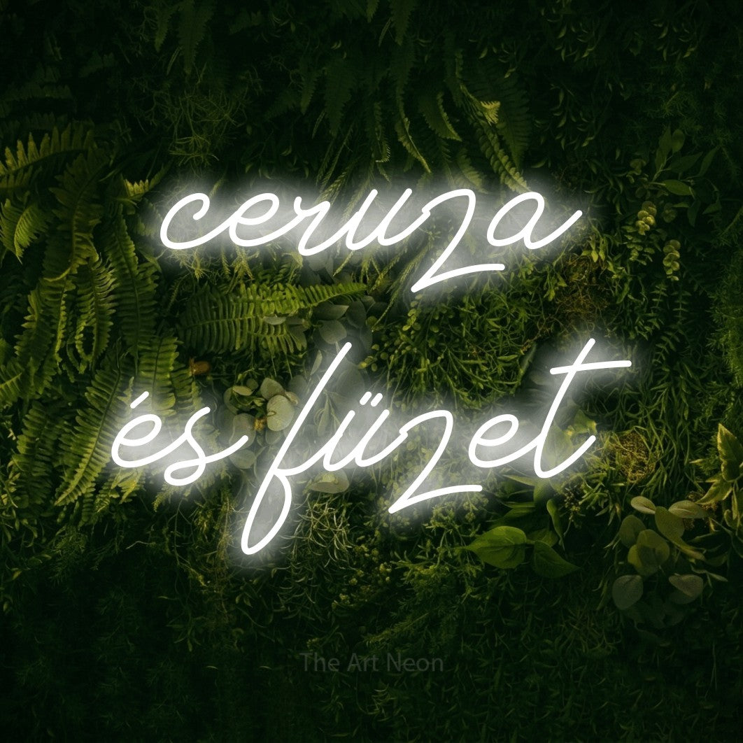 LED neon sign reading “ceruza és füzet”, arranged in two lines.