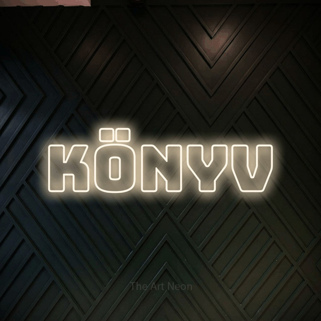 LED neon sign reading “KÖNYV”, arranged in a single line.