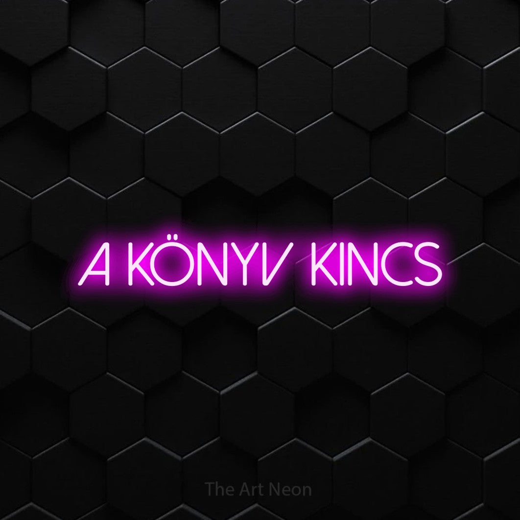 LED neon sign reading “A könyv kincs”, arranged in a single line.