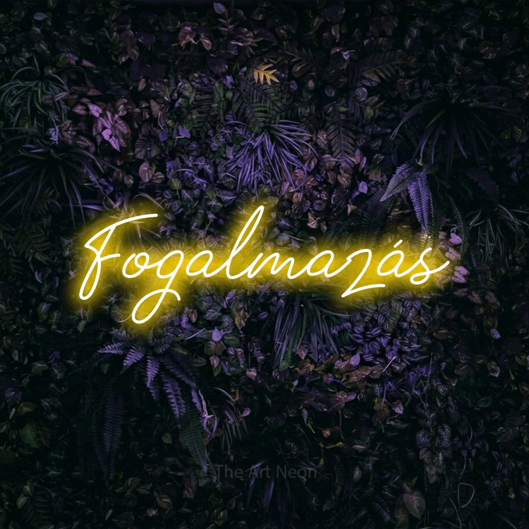 LED neon sign reading “Fogalmazás”, arranged in a single line.