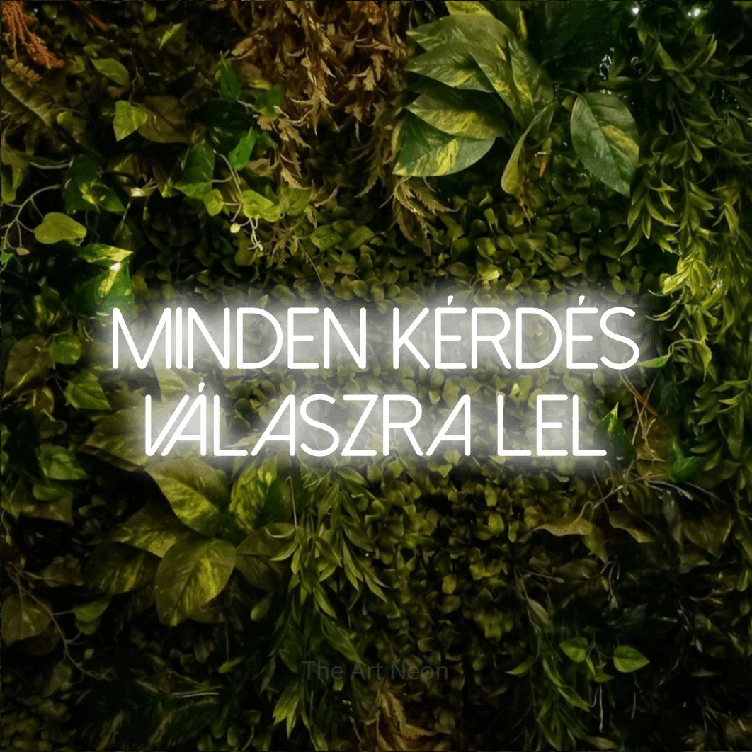 LED neon sign reading “MINDEN KÉRDÉS VÁLASZRA LEL”, arranged in two lines.