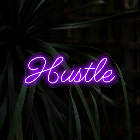 "Hustle Neon Sign" - A motivational addition to workspaces, featuring the word "Hustle" for a determined and hardworking atmosphere, creating a focused and empowering vibe.