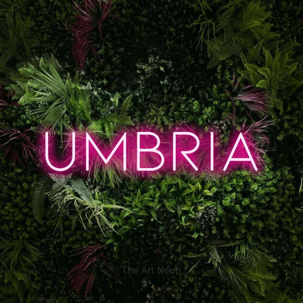 LED neon sign reading “Umbria”, arranged in a single line.