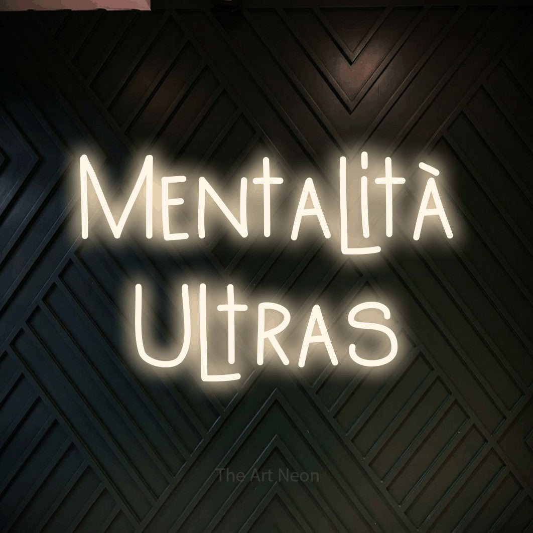 LED neon sign reading “Mentalità Ultras”, arranged in 2 lines.
