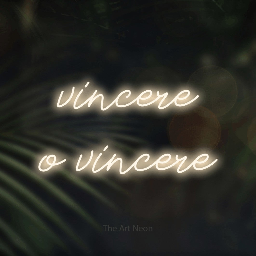 LED neon sign reading “vincere o vincere”, arranged in 2 lines.