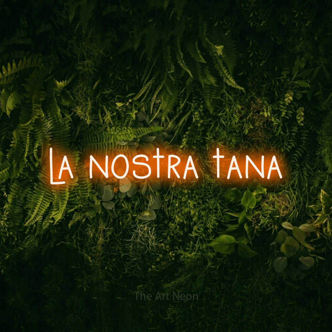 LED neon sign reading “la nostra tana”, arranged in a single line.