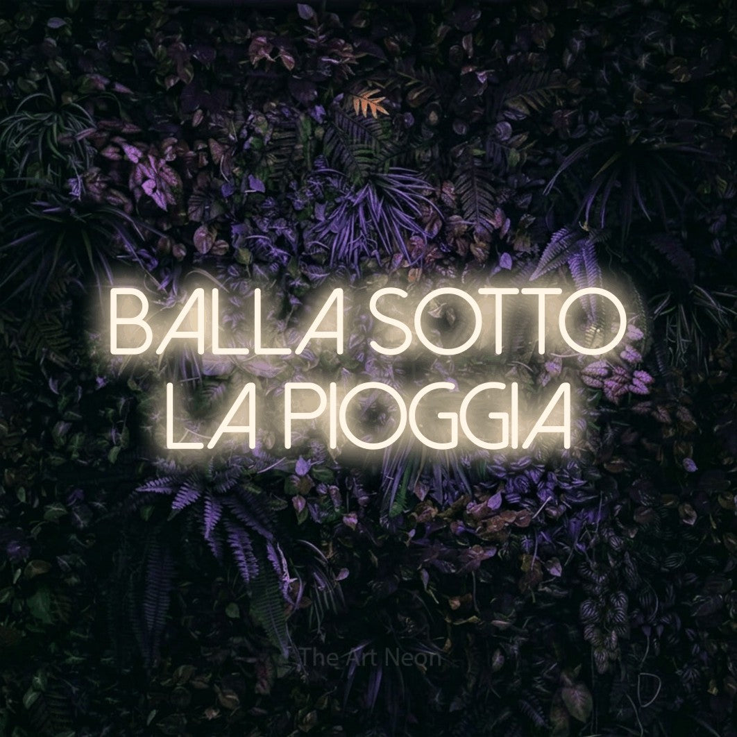 LED neon sign reading “Balla sotto la Pioggia”, arranged in 2 lines.