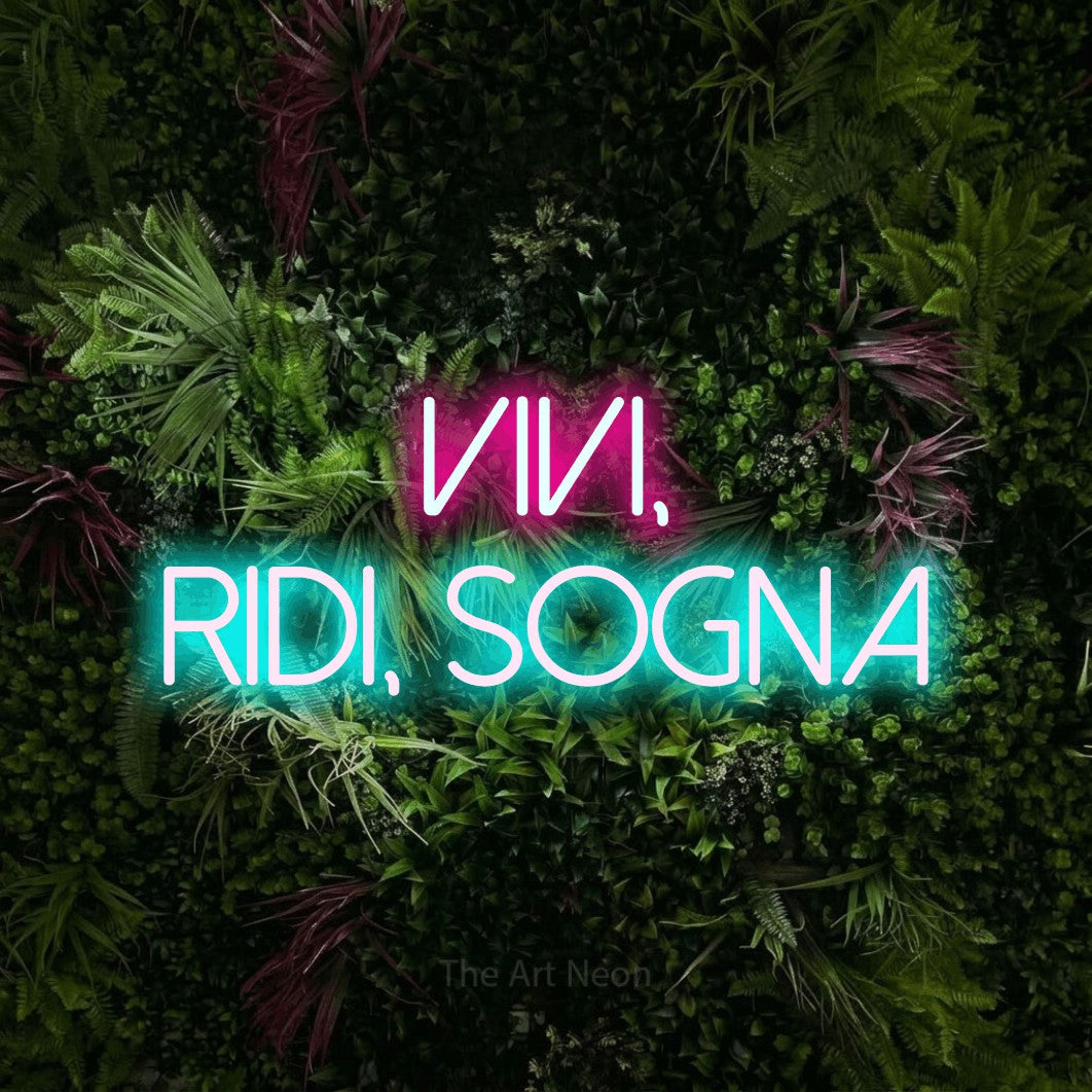 LED neon sign reading “vivi, ridi, sogna”, arranged in 2 lines.