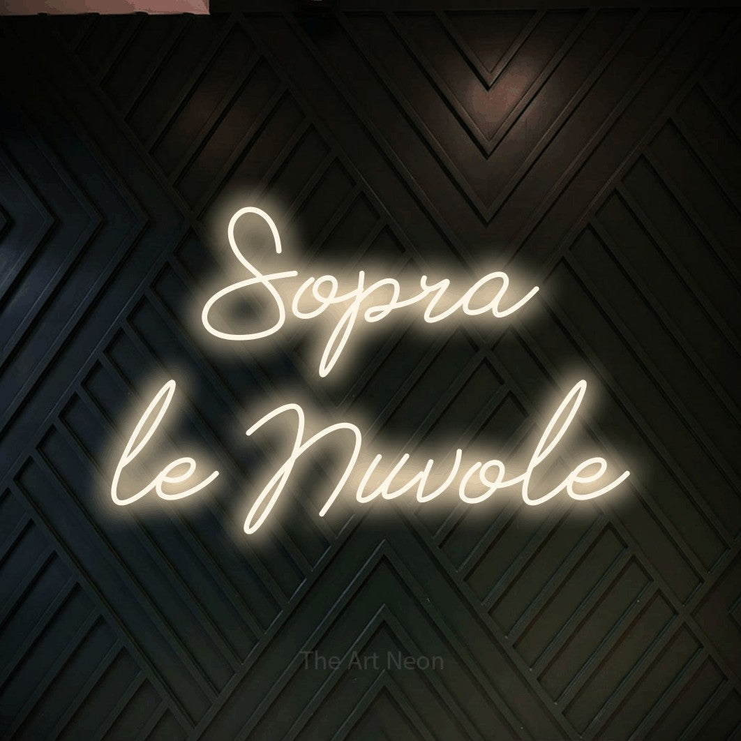 LED neon sign reading “Sopra le Nuvole”, arranged in 2 lines.