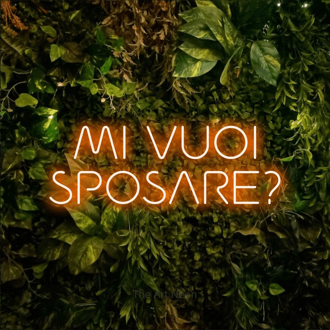 LED neon sign reading “MI VUOI SPOSARE?”, arranged in 2 lines.