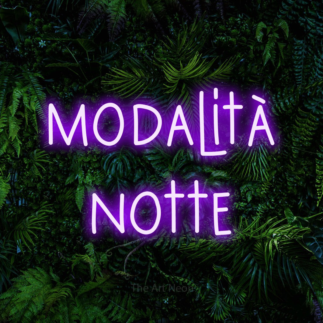 LED neon sign reading “modalità notte”, arranged in 2 lines.