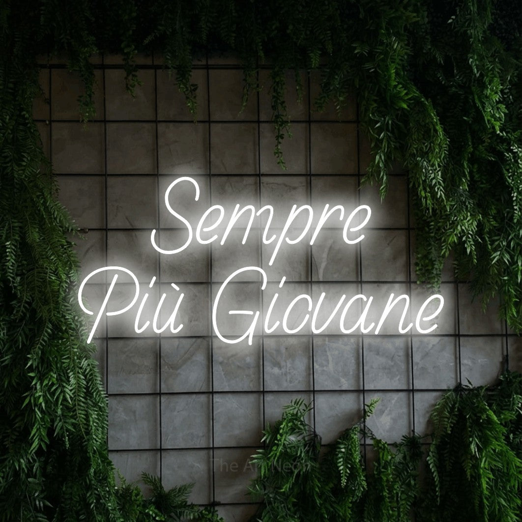 LED neon sign reading “Sempre Più Giovane”, arranged in 2 lines.