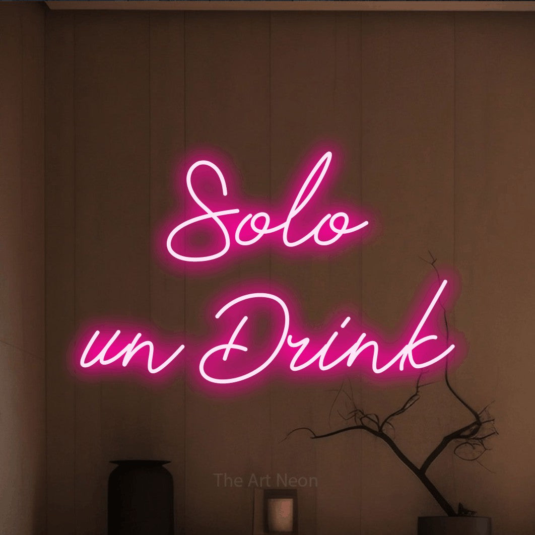 LED neon sign reading “Solo un Drink”, arranged in 2 lines.