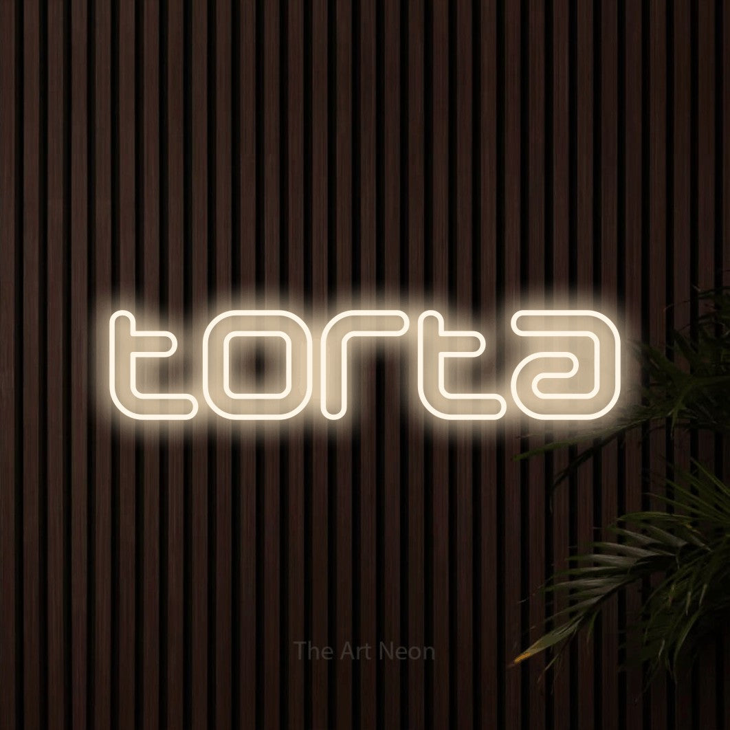 LED neon sign reading “torta”, arranged in a single line.