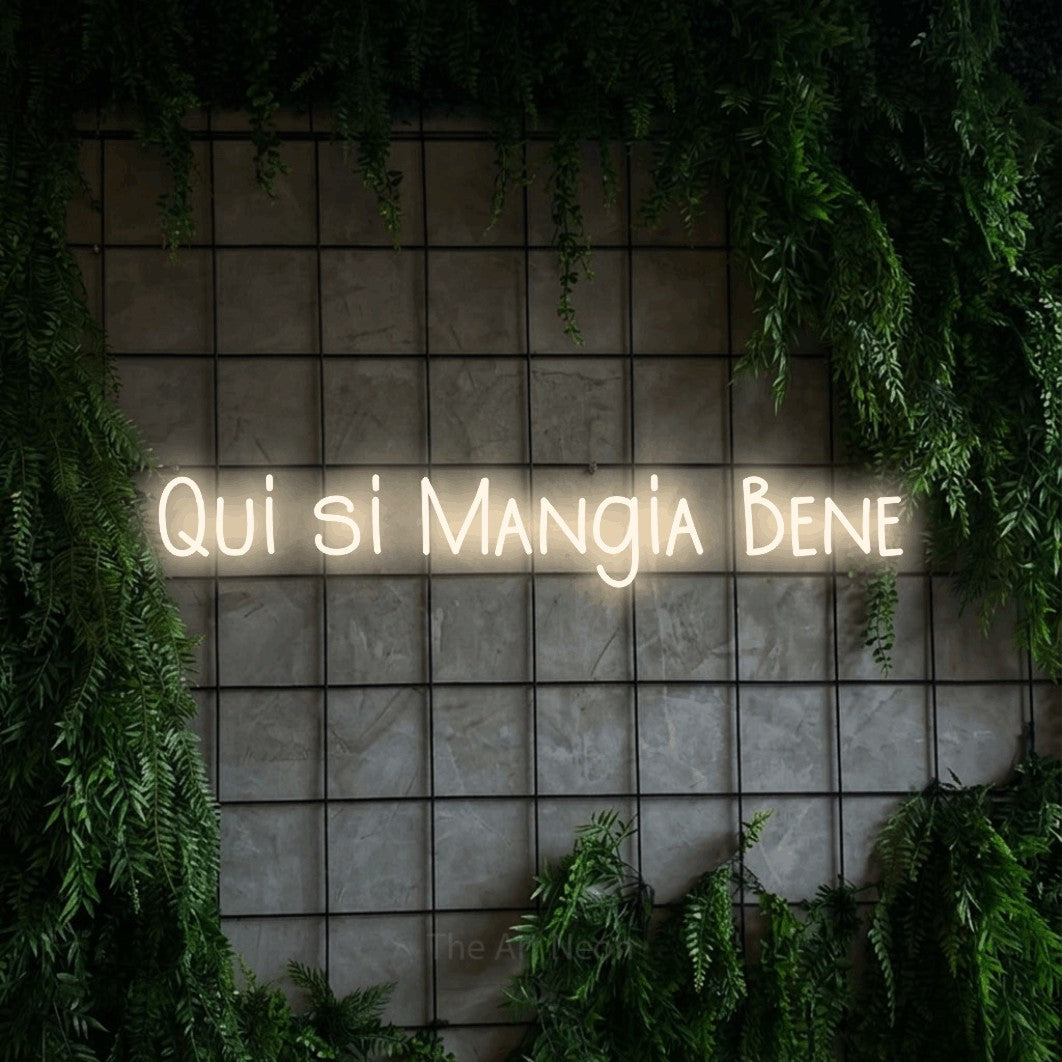 LED neon sign reading “Qui si Mangia Bene”, arranged in a single line.