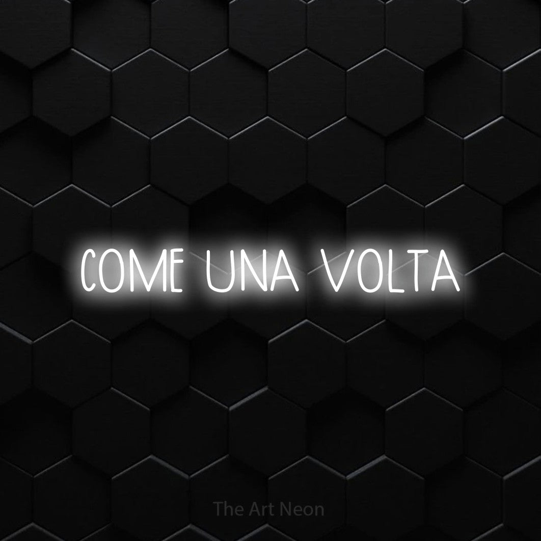 LED neon sign reading “COME UNA VOLTA”, arranged in a single line.
