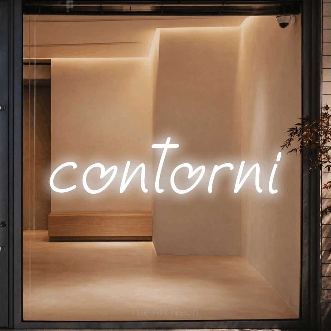 LED neon sign reading “contorni”, arranged in a single line.