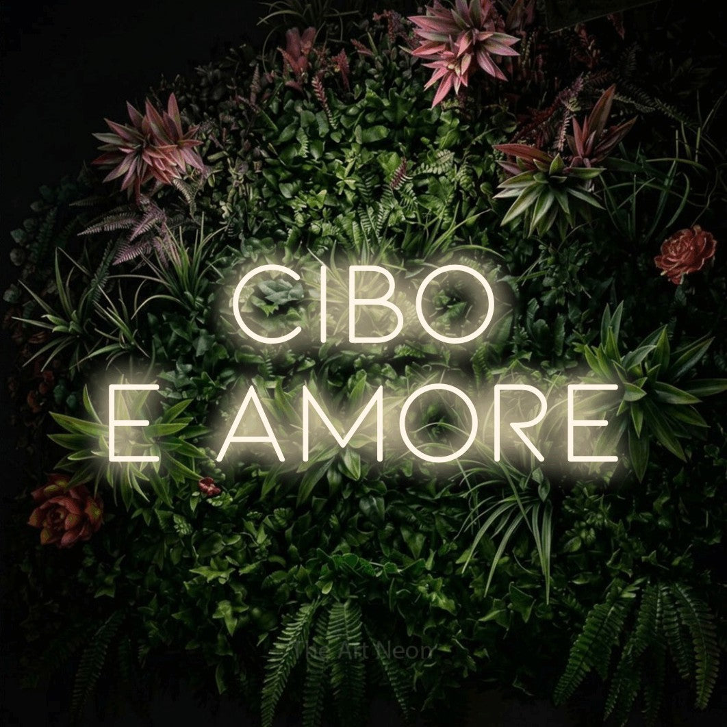 LED neon sign reading “CIBO E AMORE”, arranged in 2 lines.