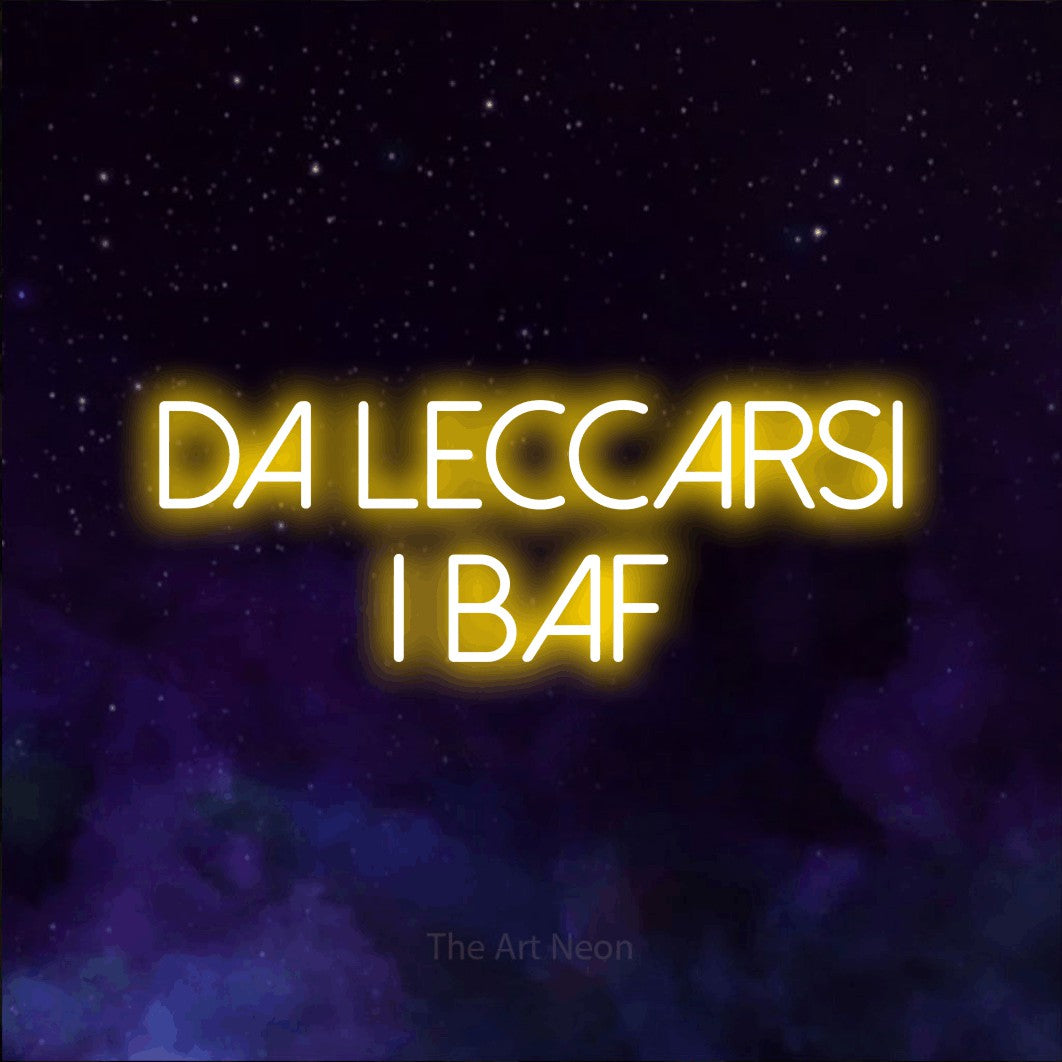 LED neon sign reading “da leccarsi i baffi”, arranged in 2 lines.