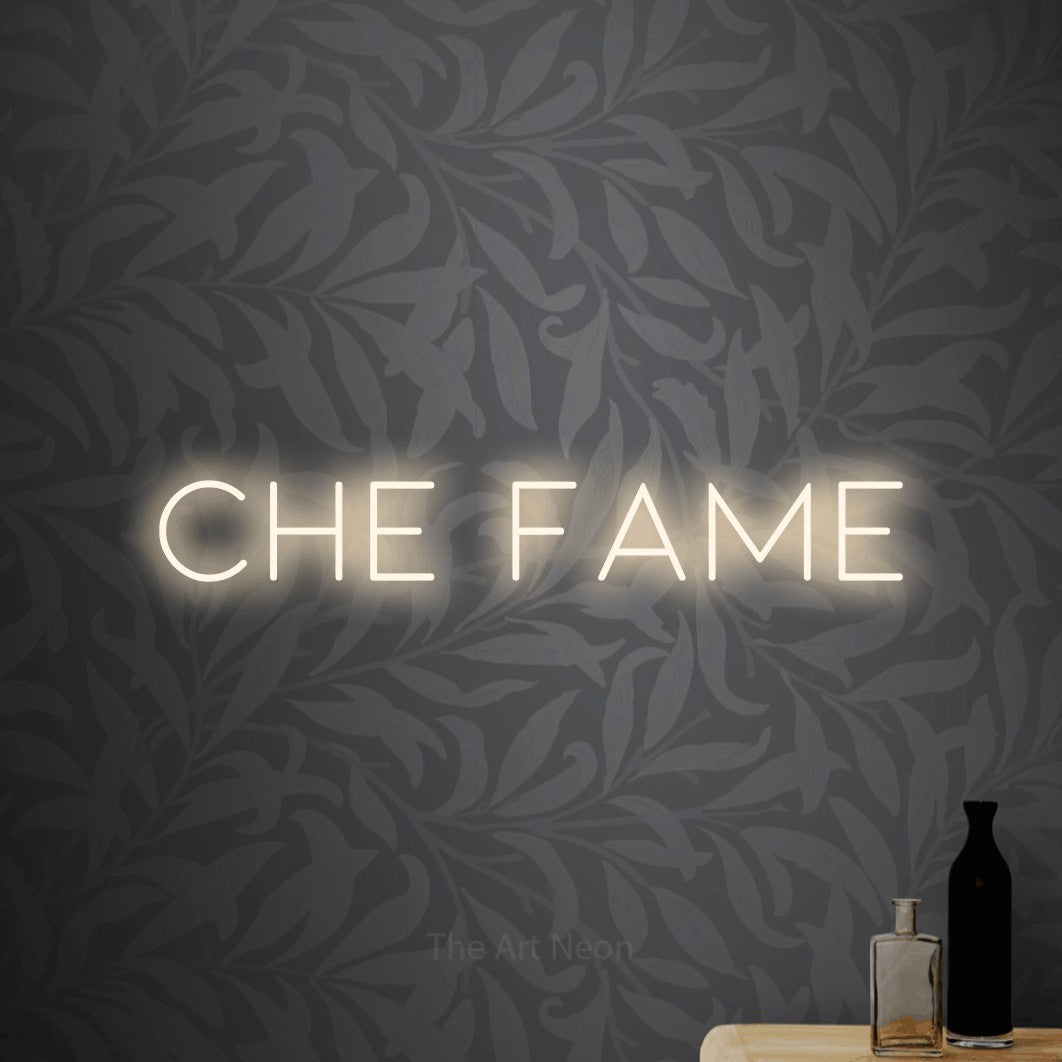 LED neon sign reading “Che Fame”, arranged in a single line.