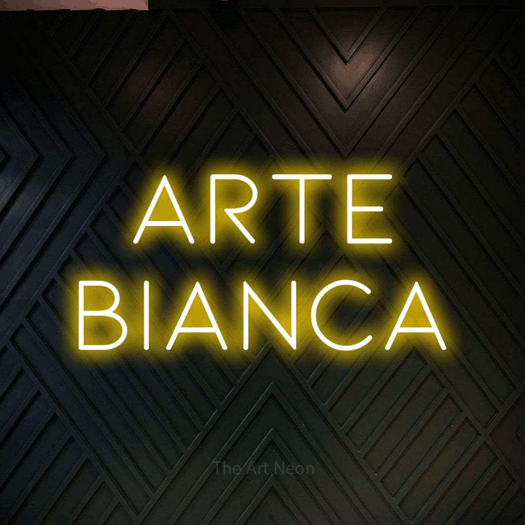 LED neon sign reading “arte bianca”, arranged in 2 lines.