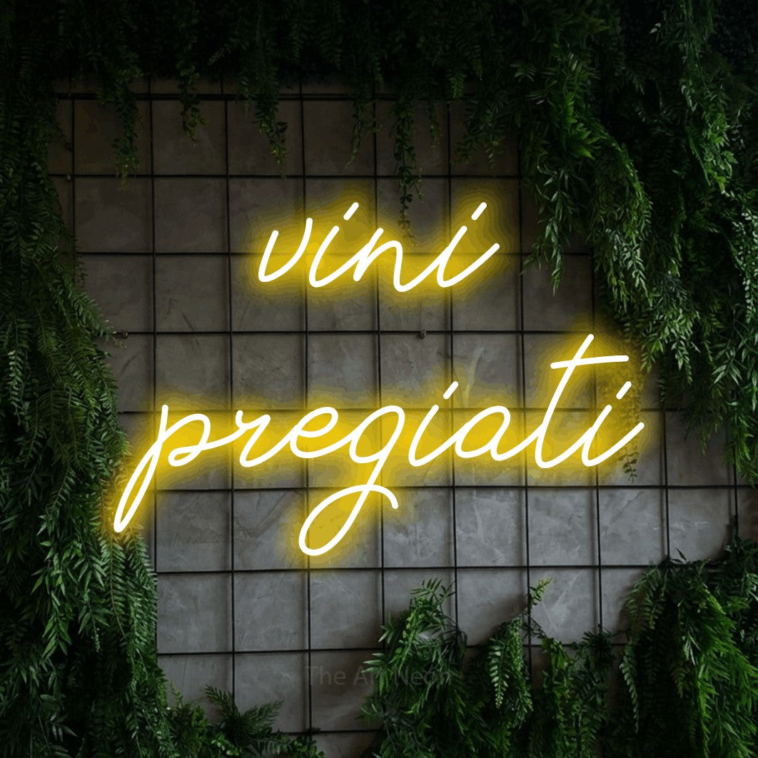 LED neon sign reading “vini pregiati”, arranged in 2 lines.